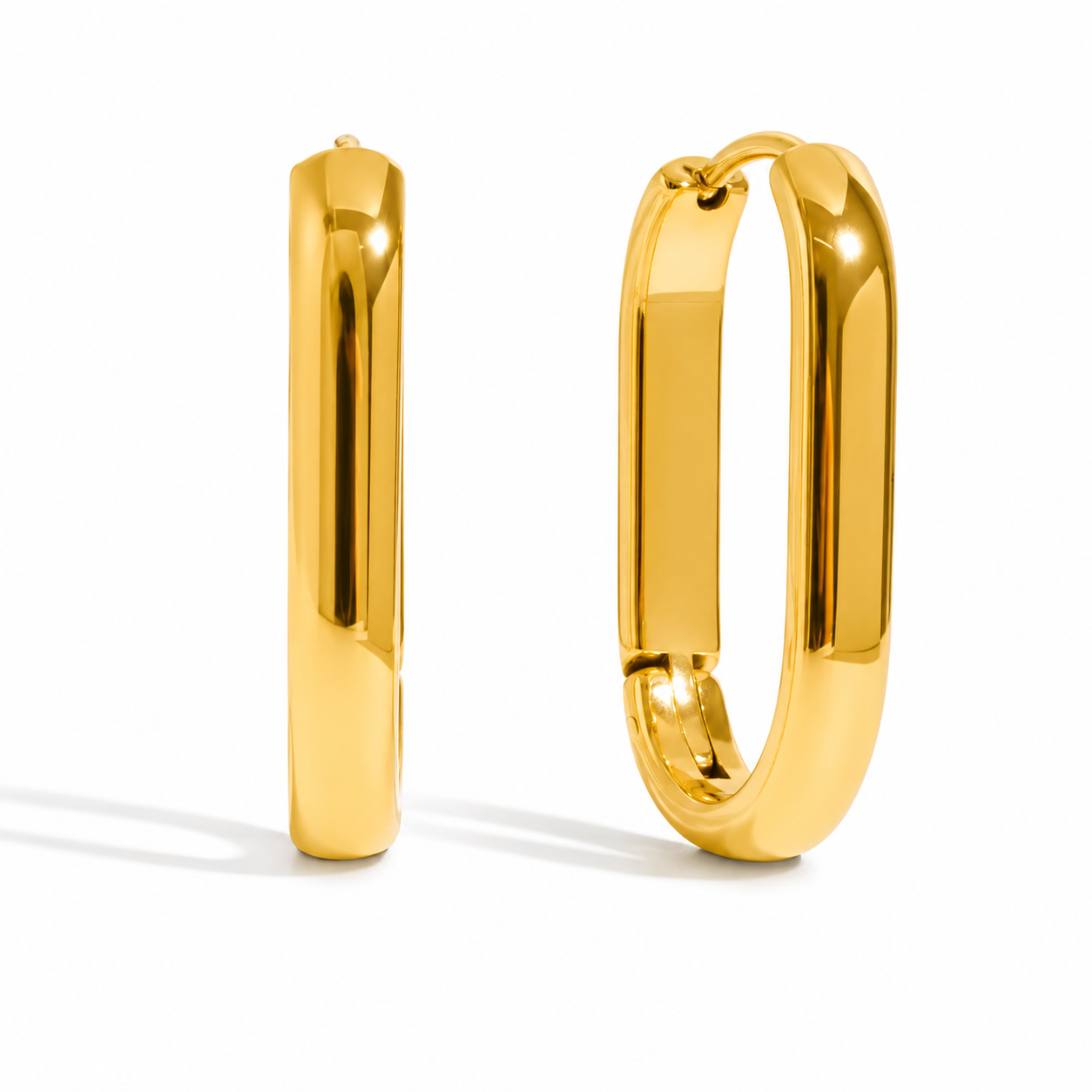 Gold hoop earrings on a white background