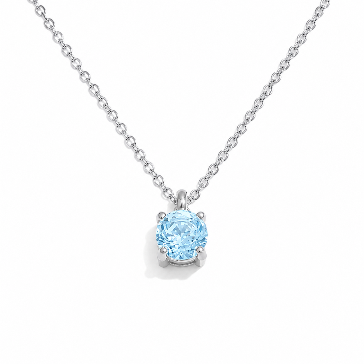 Necklace with a blue gemstone pendant on a white background